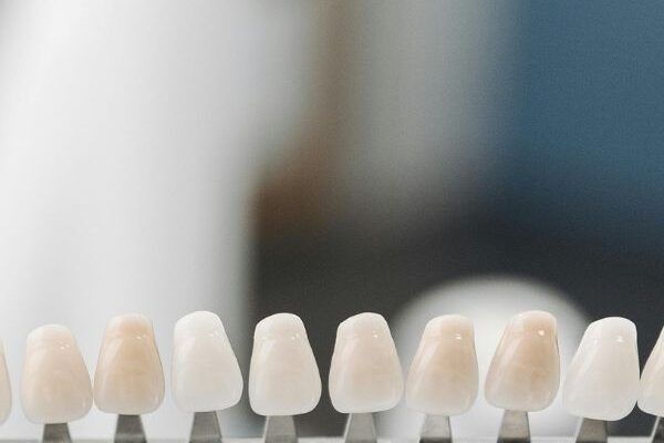 What are the components of a dental implant